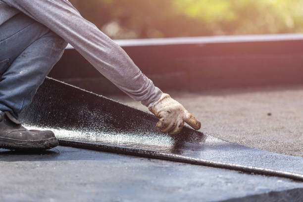 Professional Waterproofing technician working in Albertville, AL